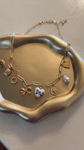 Blue floral charm necklace
