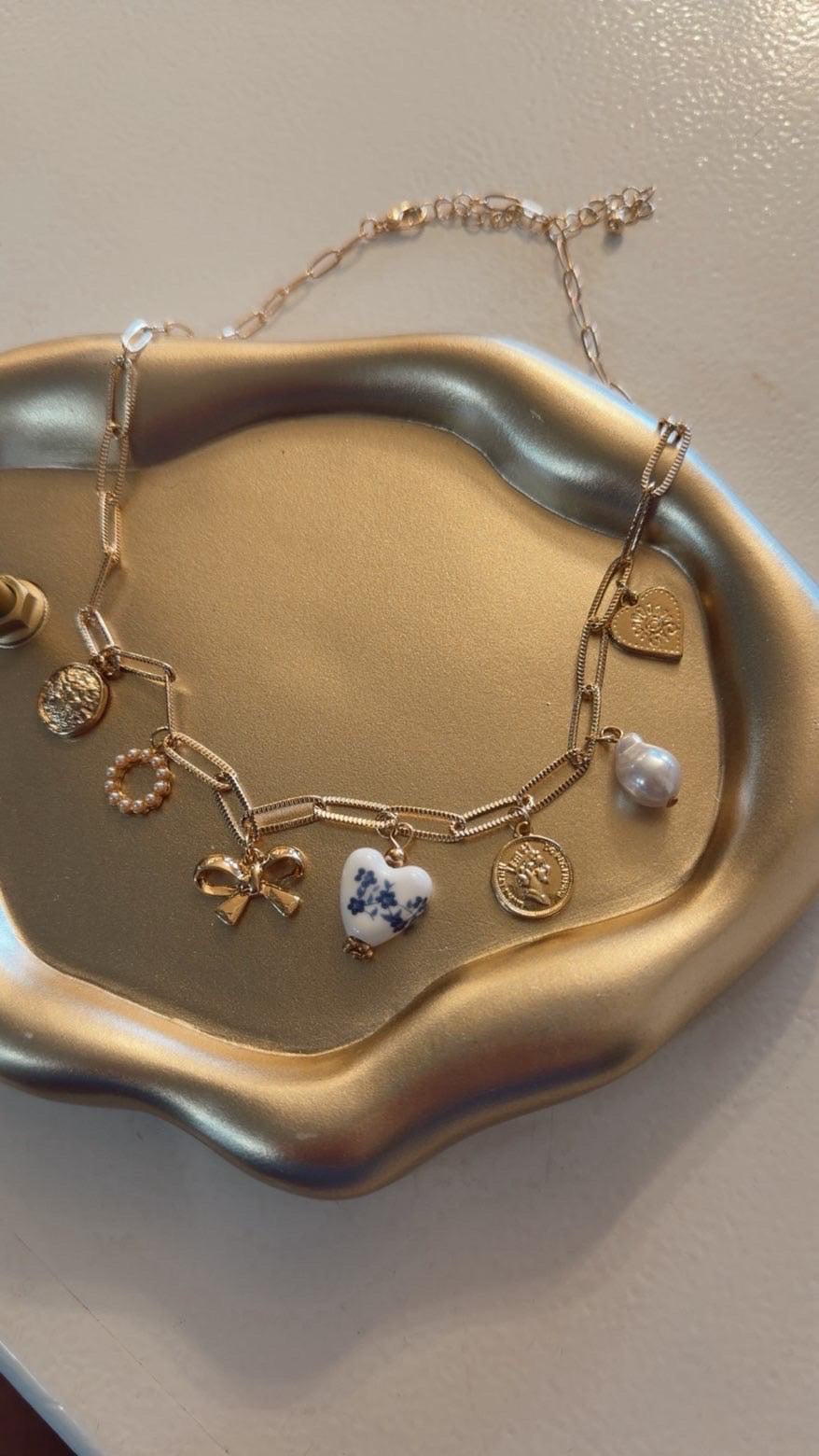 Blue floral charm necklace